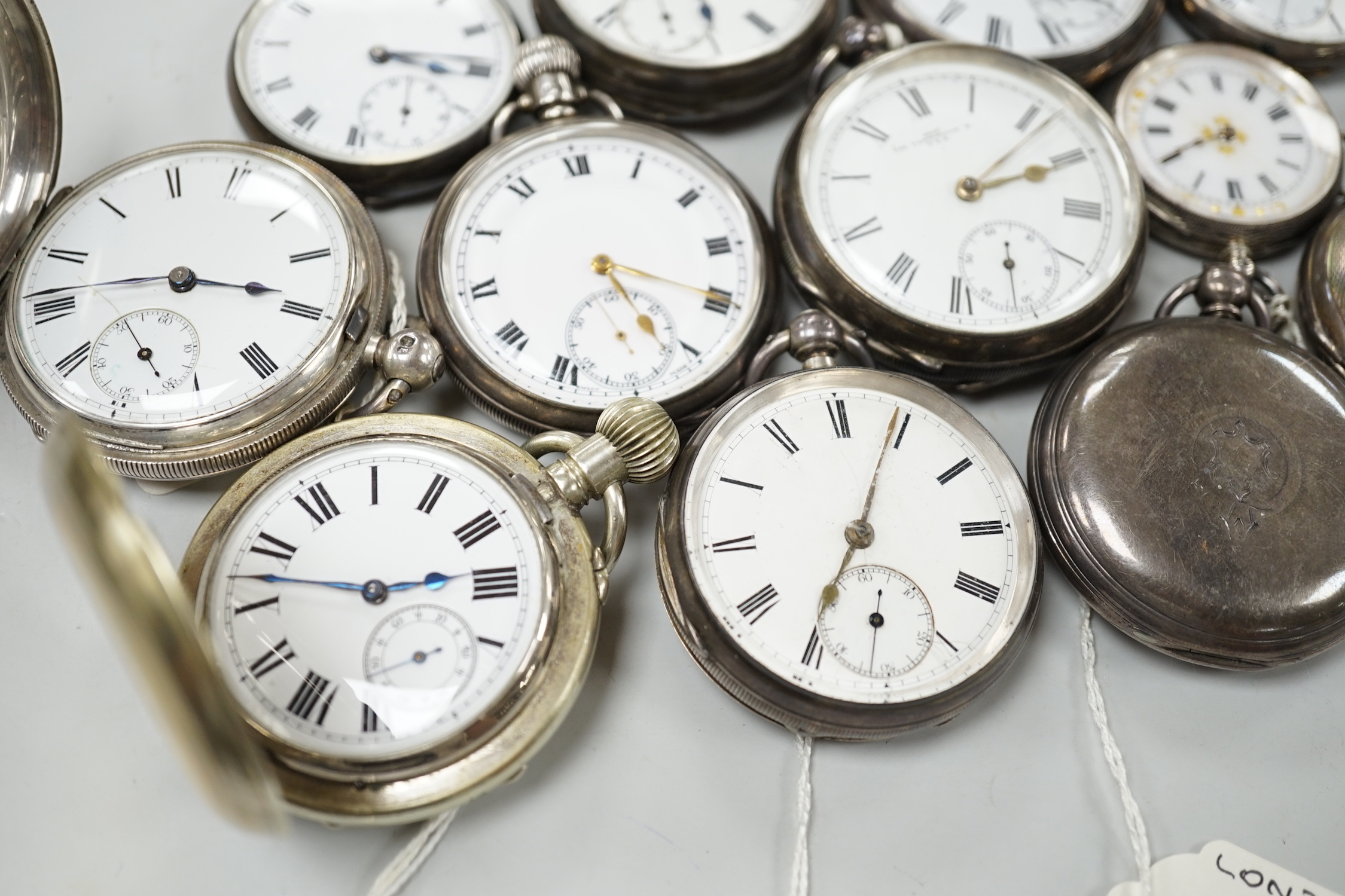 Twelve assorted mainly silver pocket watches including 'The Farringdon', Russell's and John Walker.